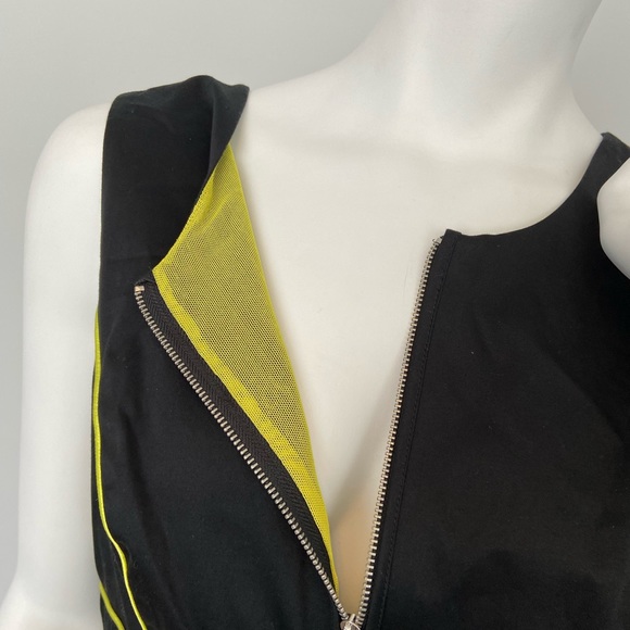 Knee length black dress with yellow accents - Picture 4 of 9